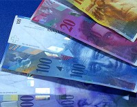 Za przewalutowanie kredytów we frankach i tak zapłacą klienci (WIDEO)